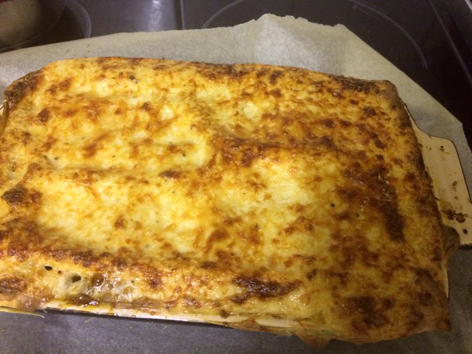 Image of Moussaka taken out of the oven